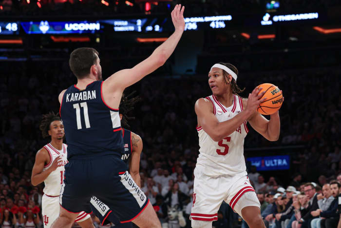 Indiana Hoosiers forward Malik Reneau (5) looks to pass as Connecticut Huskies forward Alex Karaban (11) defends during the second half at Madison Square Garden.